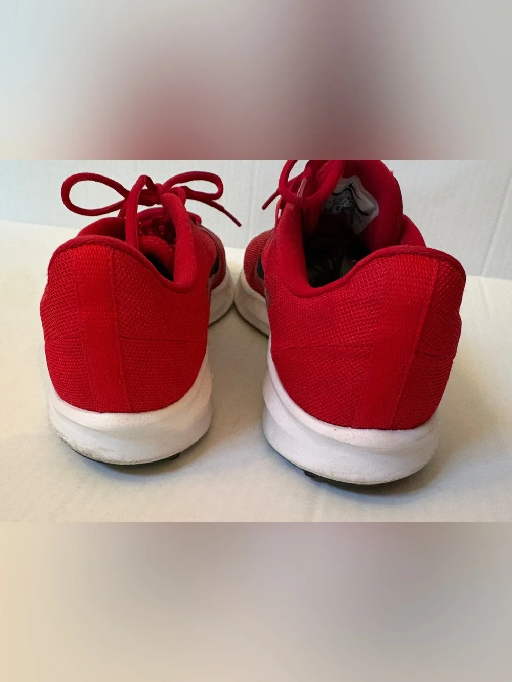 Nike Men’s Red Athletic Running Shoes with Black Swoosh